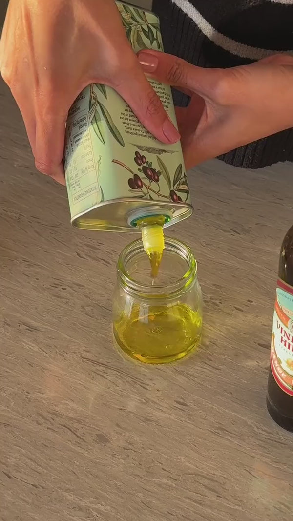 Dressing a burrata and citrus salad with African Oils orange balsamic vinegar
