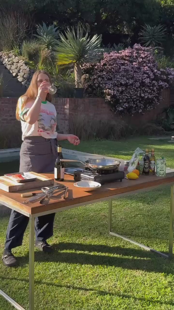 Searing salmon in African Oils olive oil and serving it with salsa verde, by @oliveatery